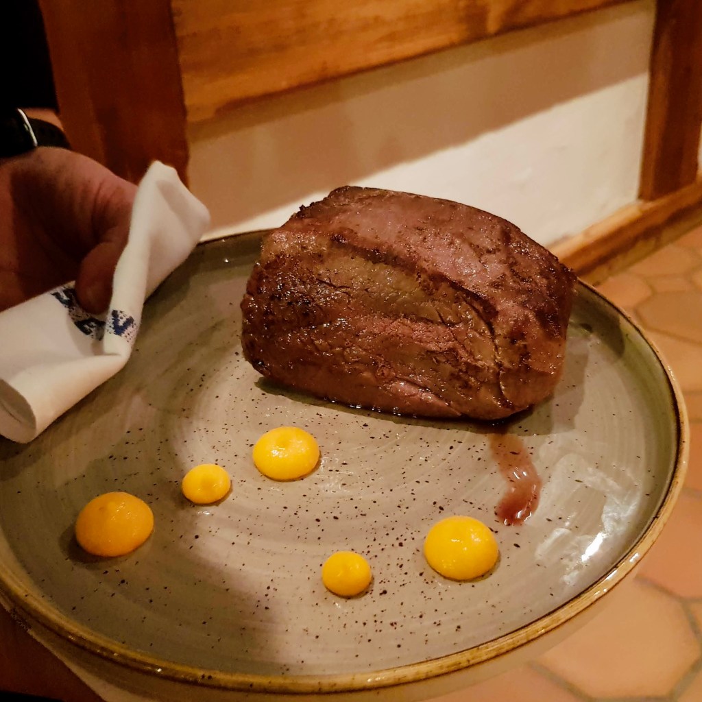 Cosy classic Swiss restaurant Grindelwald Switzerland charming dog friendly family couples friends cordon bleu chateaubriand salad good value large portion children menu ice cream